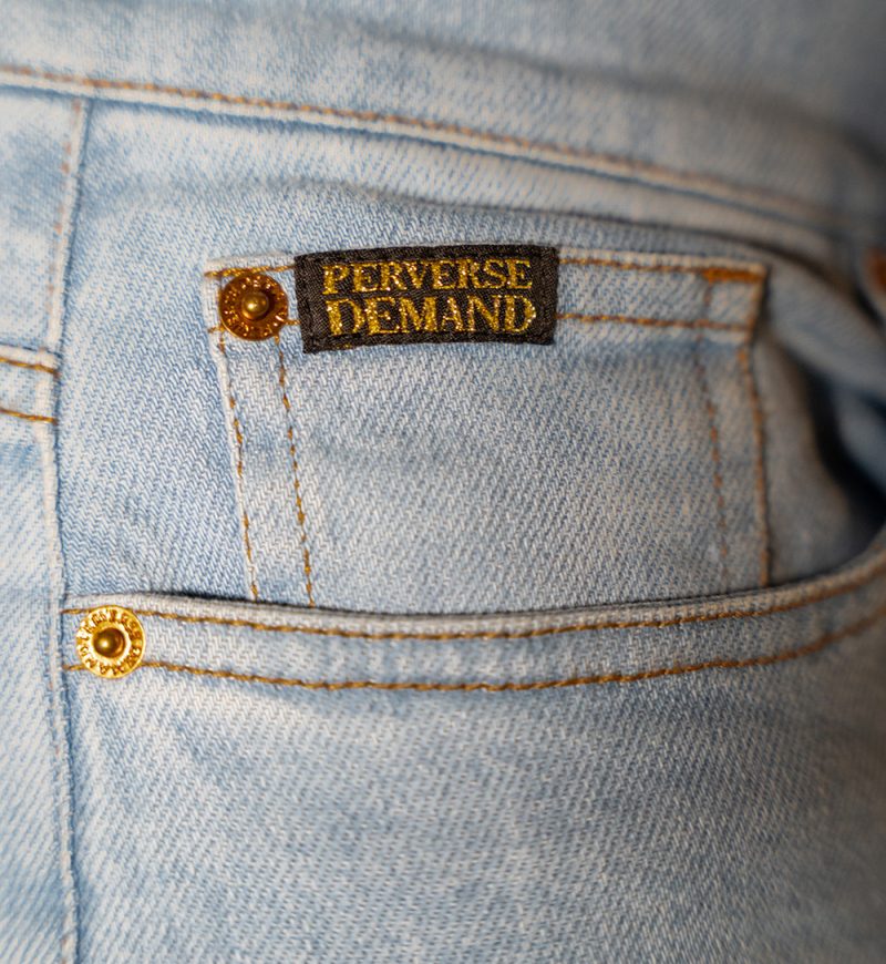 Perverse Demand's Ombre Jean, hip pocket detail and branding