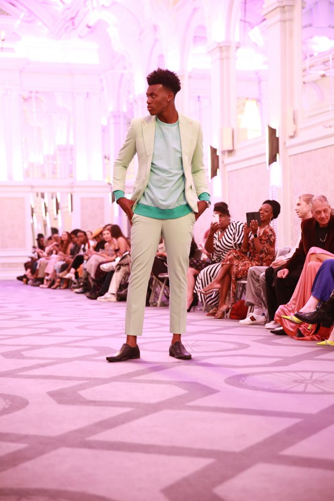 Creative Director Nathan Palmer mixed his bespoke British tailoring with Perverse Demand's casual wear on the catwalk for London Fashion Week 