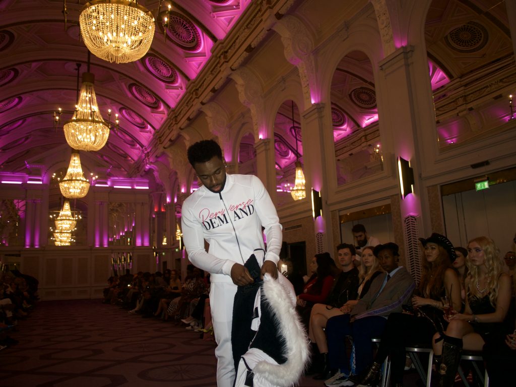 Streetstyle on the catwalk at London Fashion Week. Perverse Demand's white tracksuit, effortless, timeless style. 